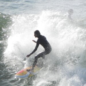 Baryon Bay beach surfer on the wave