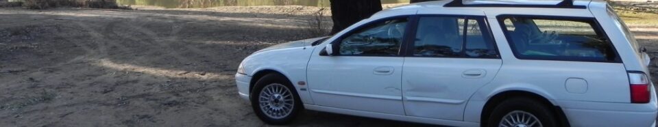 Cropped white car station wagon