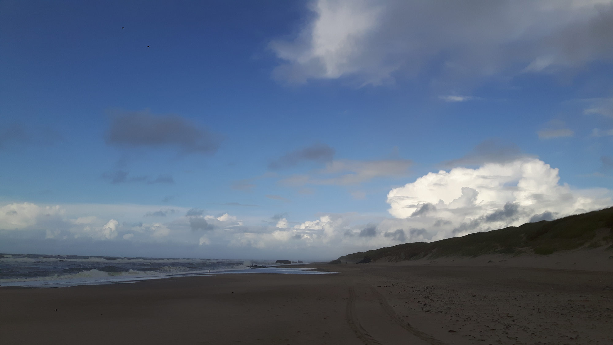 Wolken am Strand von Fjand Badeby